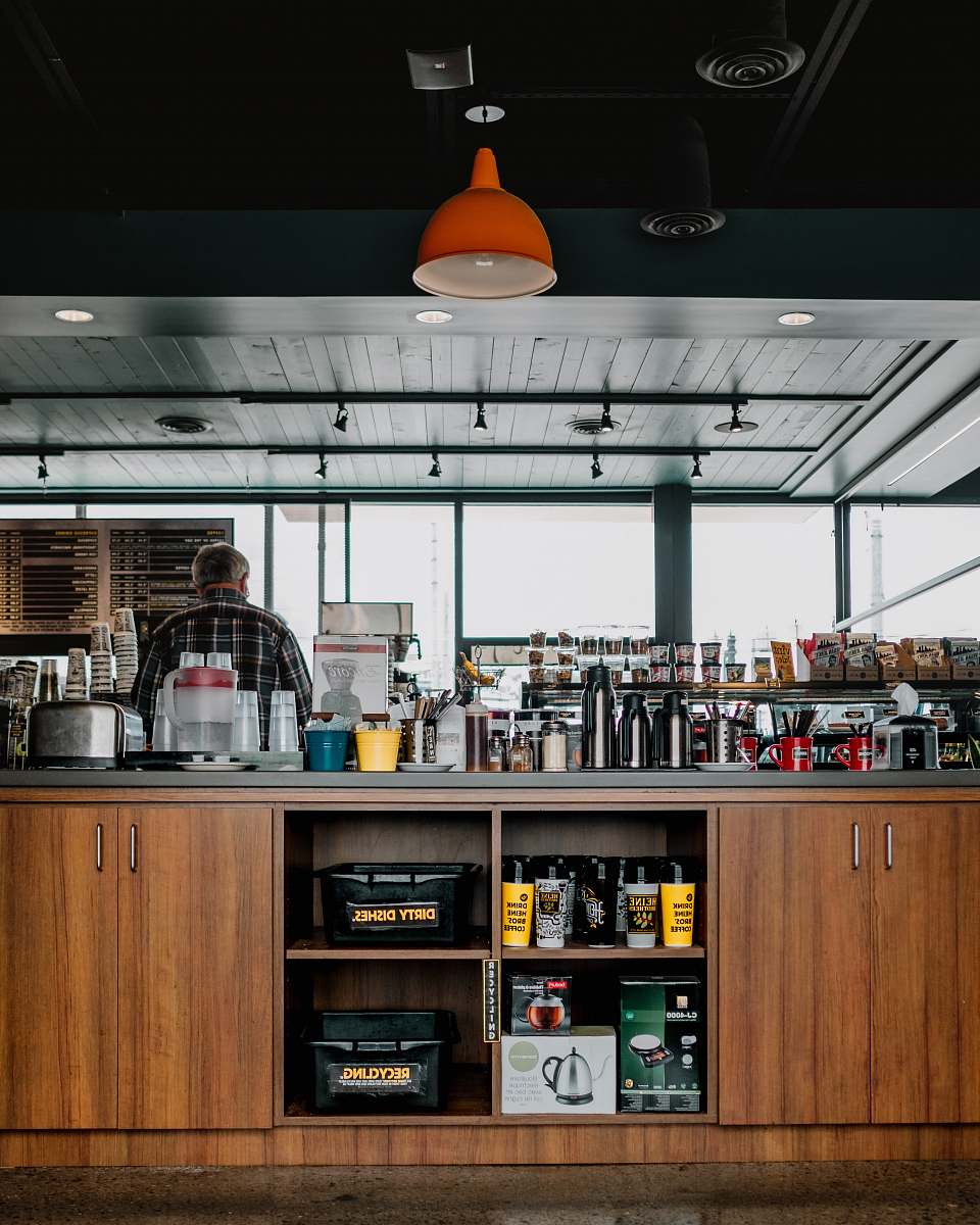 heine brothers' - hikes point man standing on the kitchen inside the room louisville